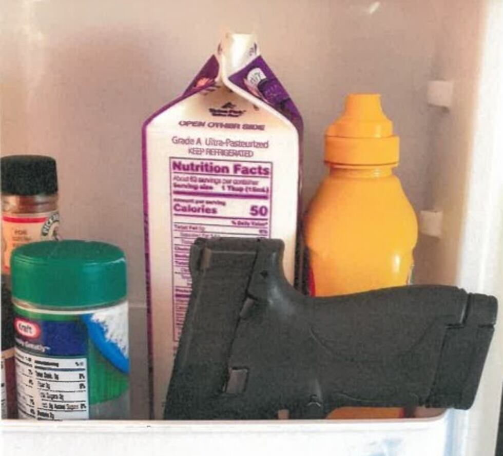 Balk allegedly wrote, "Extort this pigs," with a photo of what appears to be a handgun in the...