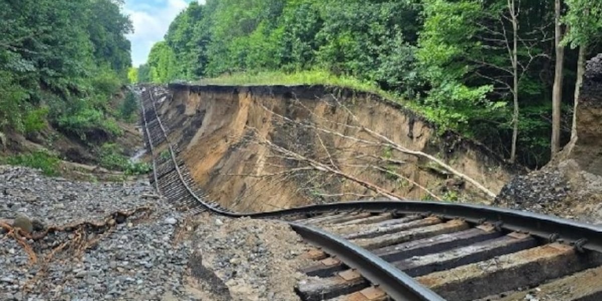 Rail Damage Crews work to fix railroad tracks damaged in Friday’s storm