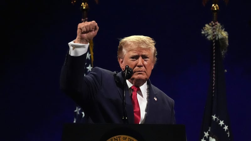President Donald Trump gestures at the conclusion of his speech during Salute to America, an...