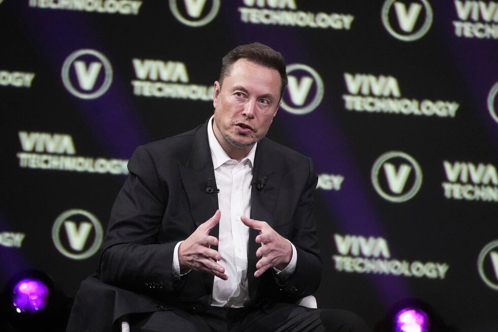 FILE - Elon Musk, who owns Twitter, Tesla and SpaceX, speaks at the Vivatech fair Friday, June...
